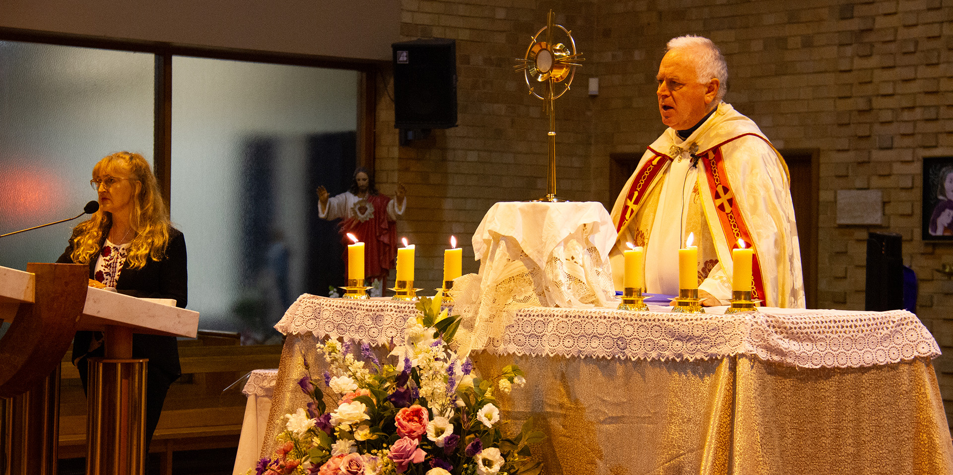 Fr Rozo during Eucharistic Adoration in Melbourne